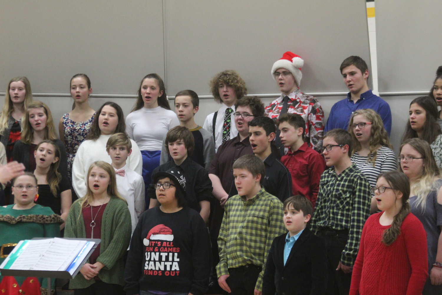 The Mid-Prairie Middle School seventh- and eighth-grade choir performs at their holiday concert on Dec. 12.